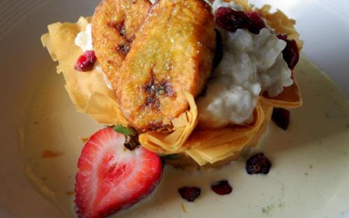 Served chilled in a lime sugared phyllo cup w/dried cranberries, fried plantains & a vanilla rum anglaise