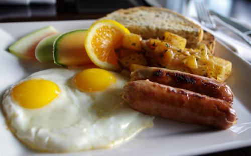 Your choice of eggs served with bacon or sausage, home fries and a choice of toast